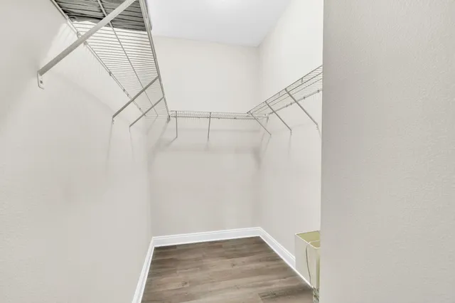 a view of a room with racks on the wall