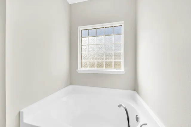 a close up of a wall with a window