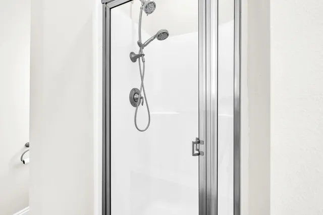 a view of a living room and a floor to ceiling window