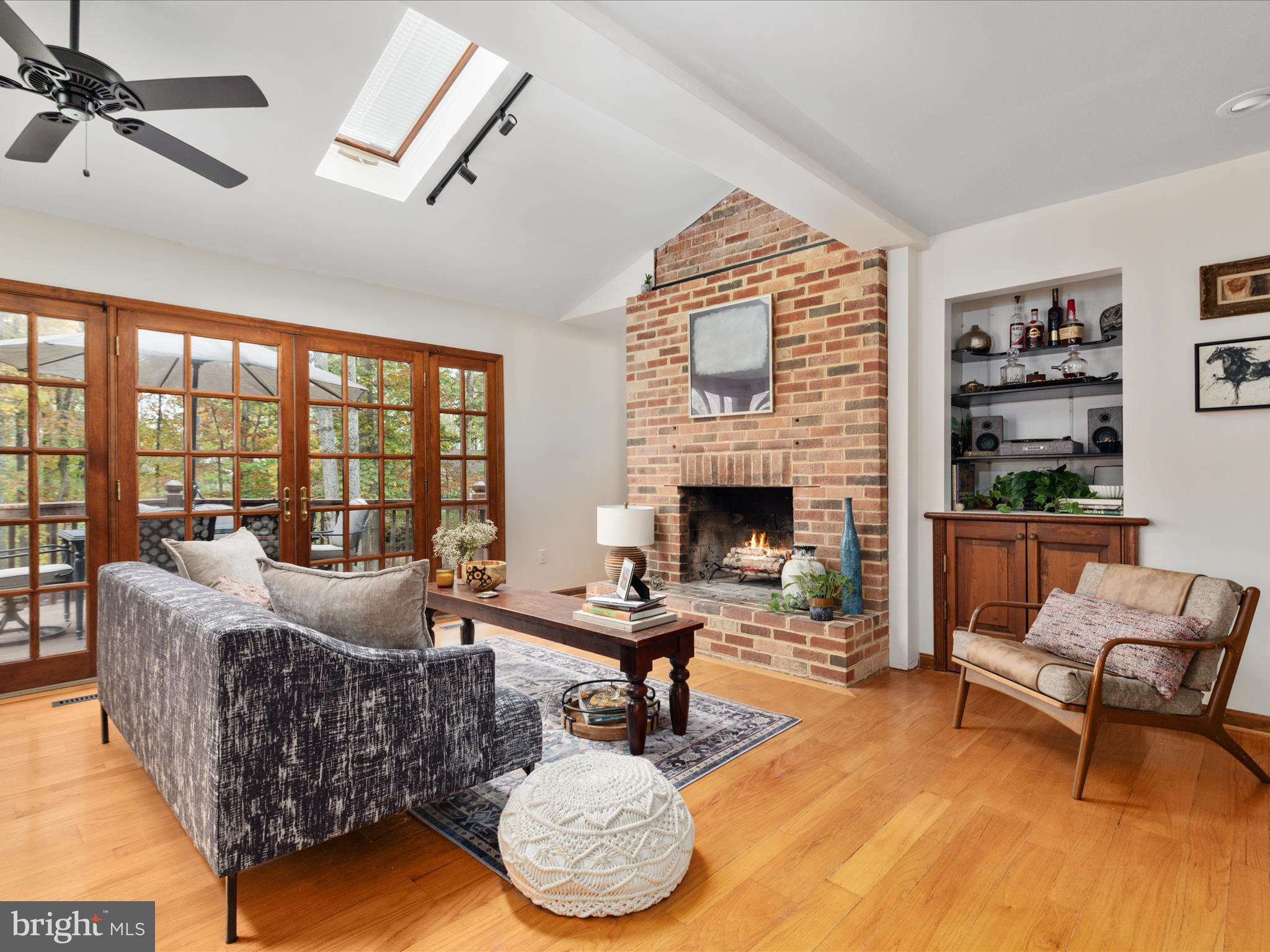 7261 Baldwin Ridge Road Warrenton, VA 20187 - Photo 20 of 76 a living room with furniture fireplace and a table