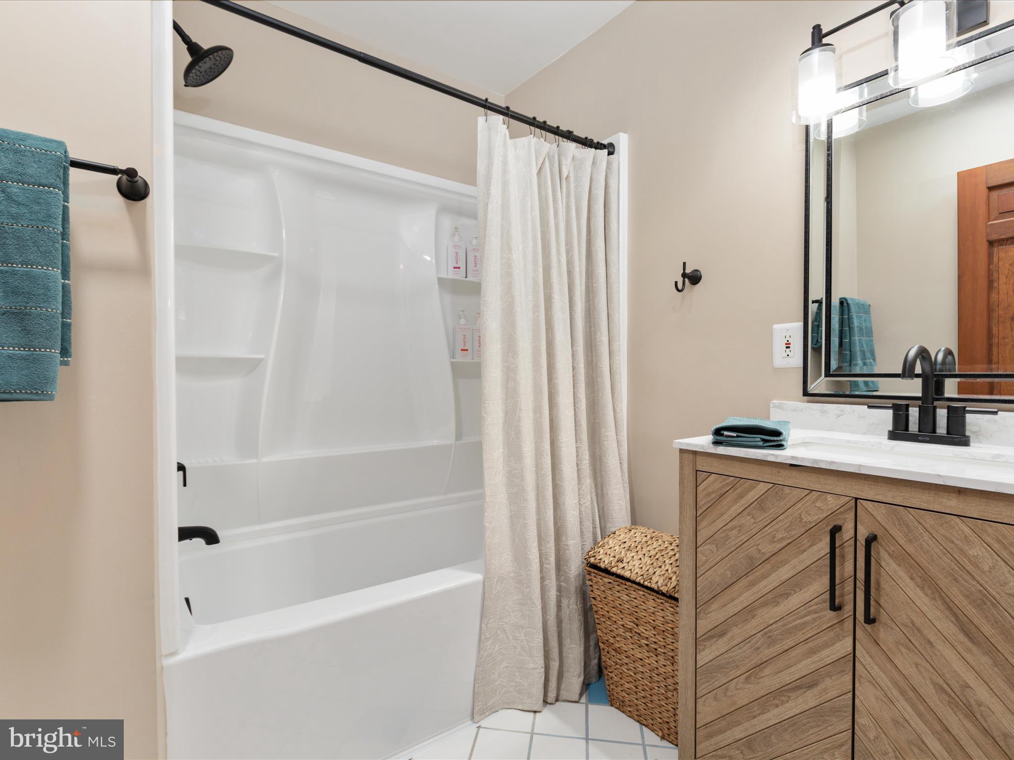 7261 Baldwin Ridge Road Warrenton, VA 20187 - Photo 42 of 76 a bathroom with a sink and a mirror