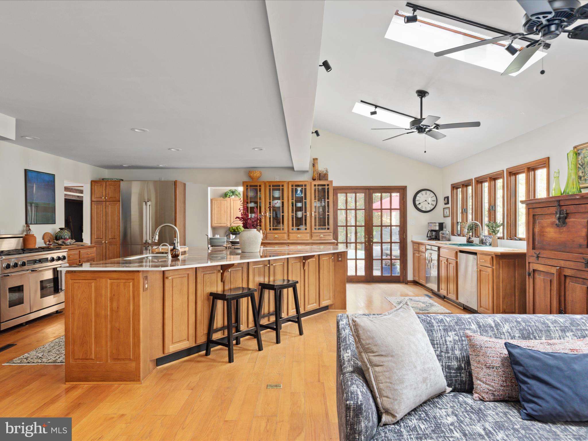 7261 Baldwin Ridge Road Warrenton, VA 20187 - Photo 5 of 76 a living room with furniture kitchen view and a large window