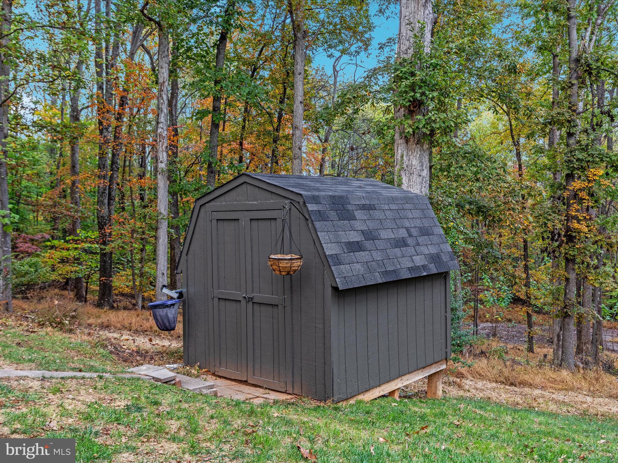 7261 Baldwin Ridge Road Warrenton, VA 20187 - Photo 52 of 76 a view of a barn house with a large window and wooden fence