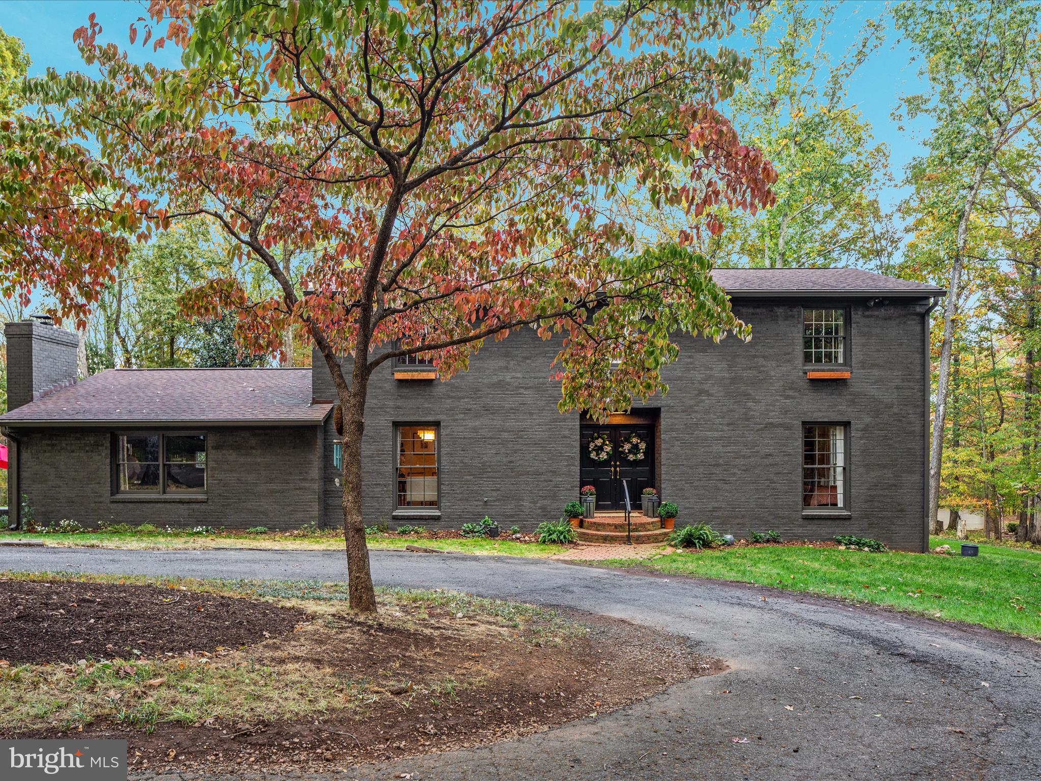 7261 Baldwin Ridge Road Warrenton, VA 20187 - Photo 60 of 76 a front view of a house with a yard