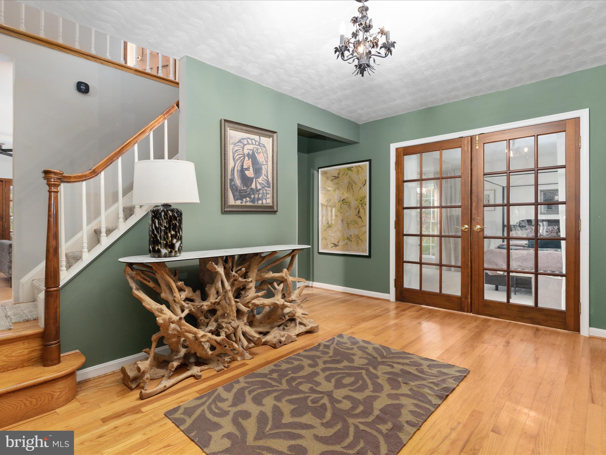 7261 Baldwin Ridge Road Warrenton, VA 20187 - Photo 8 of 76 a view of a livingroom with wooden floor and furniture