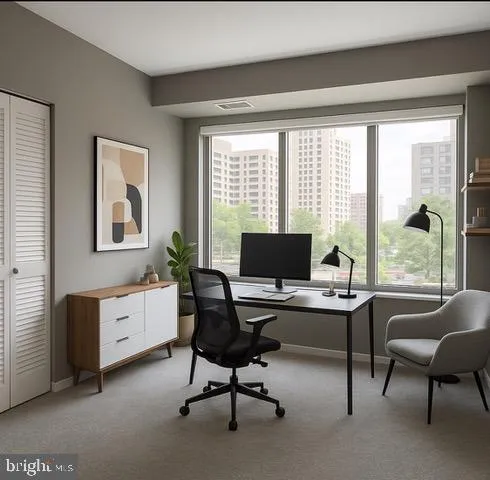 a view of an empty room with a window