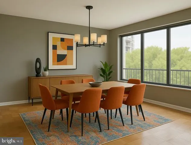 a dining room with furniture window and wooden floor