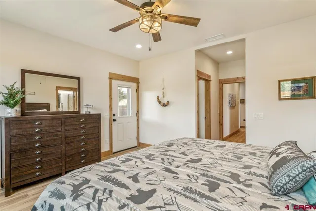 a bathroom with a sink vanity and a mirror