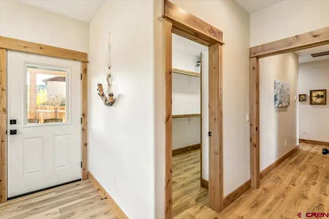 a view of a house with a small yard and plants