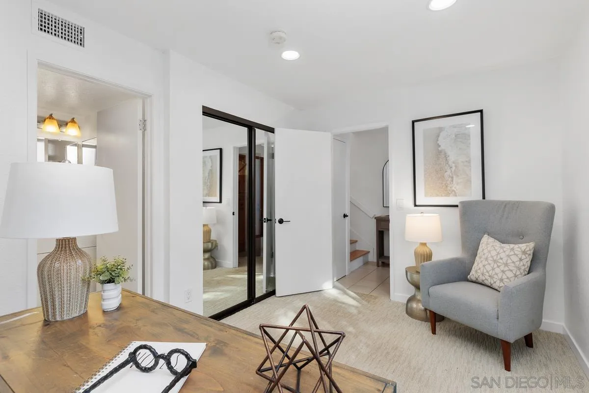 2364 Altisma Way, Unit B Carlsbad, CA 92009 - Photo 8 of 26 a living room with furniture and wooden floor