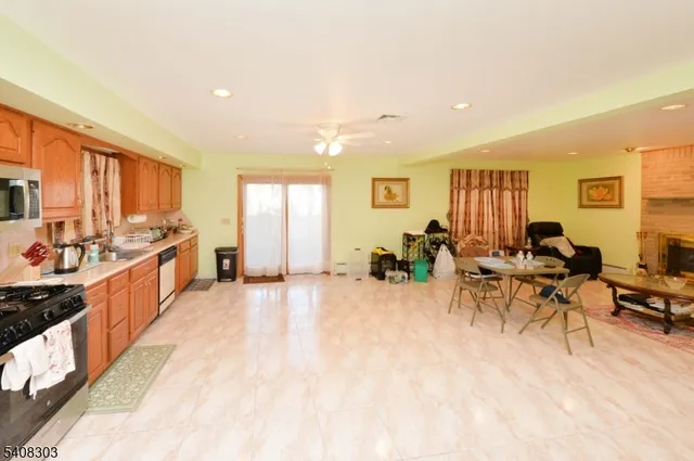 a large white kitchen with lots of counter top space