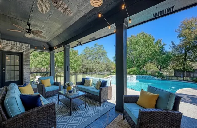a outdoor living space with furniture and garden view