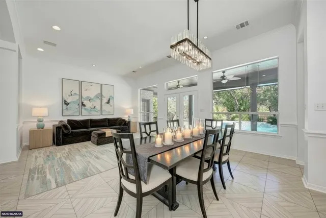 a view of a dining room with furniture window and outside view