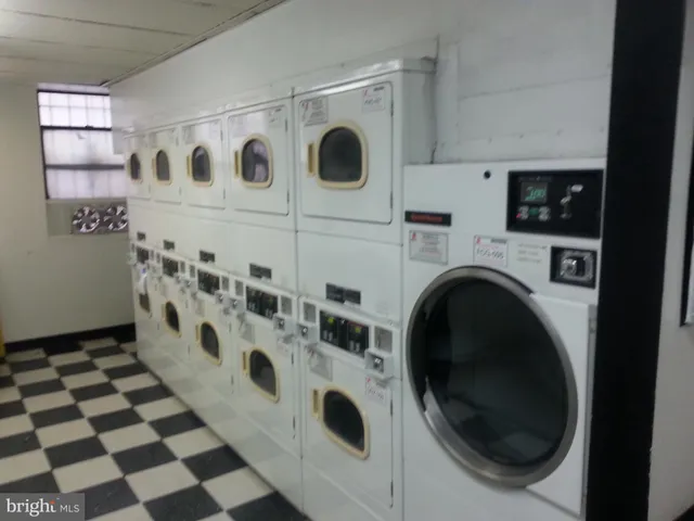 a view of kitchen with a stove top oven and cabinets
