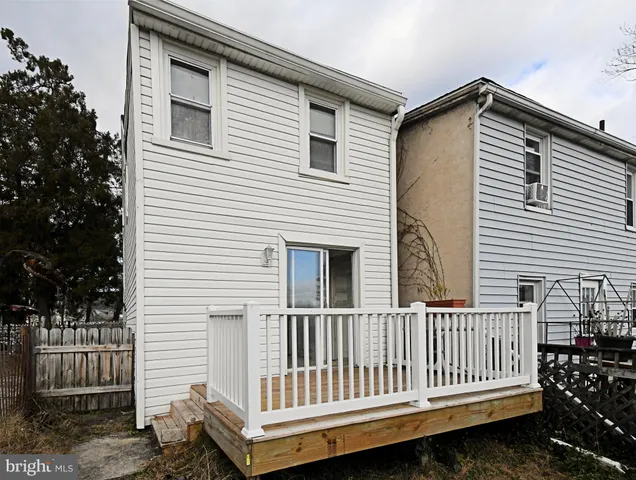 a view of a street with cars