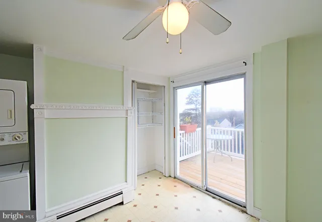 a view of a hallway with a window