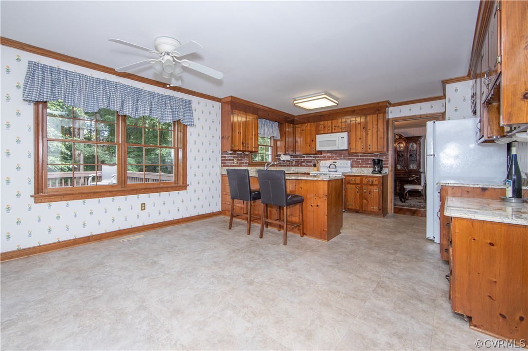 13312 Lady Ashley Road Midlothian, VA 23114 - Photo 3 of 29 Kitchen with granite counters, bar seating, desk a