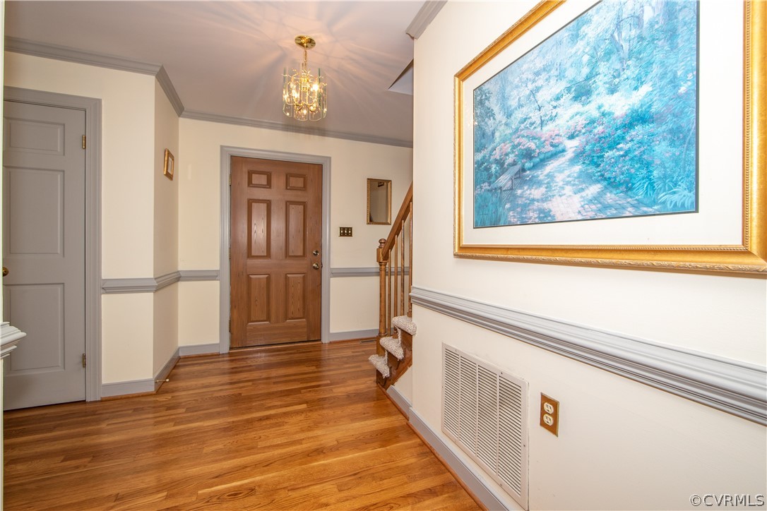 13312 Lady Ashley Road Midlothian, VA 23114 - Photo 10 of 29 Foyer with hardwood floors and double-doored coat