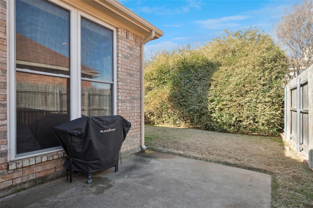 5501 Mt McKinley Road Fort Worth, TX 76137 - Photo 24 of 26 a view of balcony with furniture and a gate
