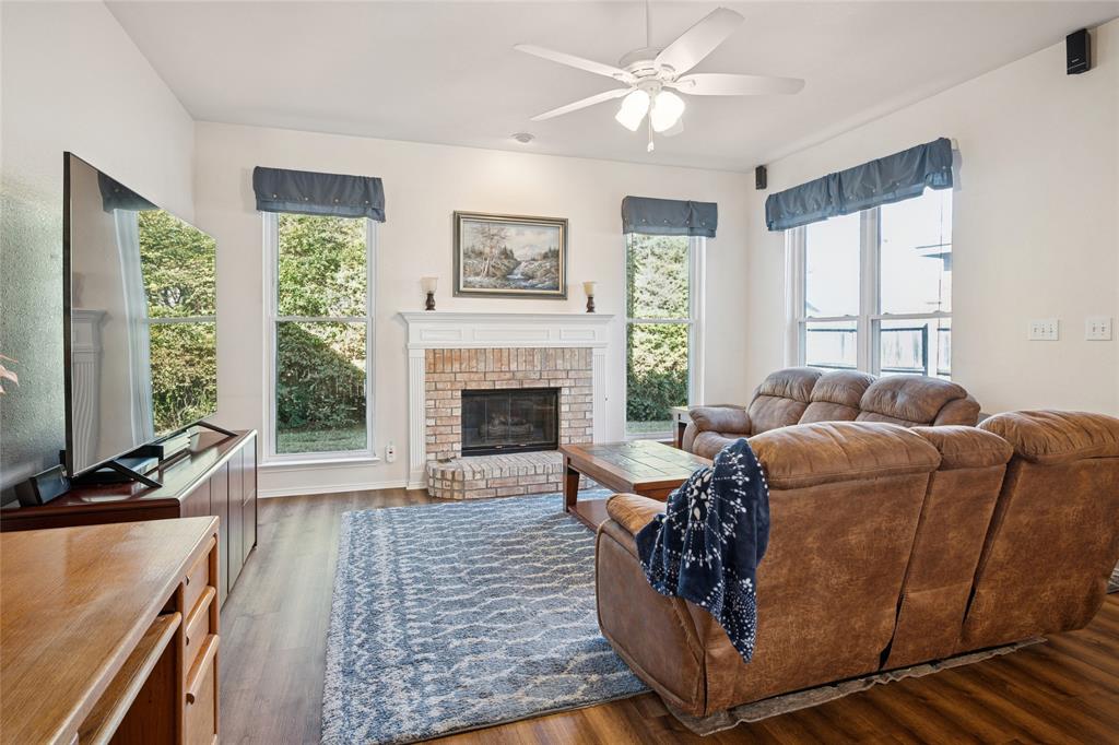 5501 Mt McKinley Road Fort Worth, TX 76137 - Photo 6 of 26 a living room with furniture fireplace and window
