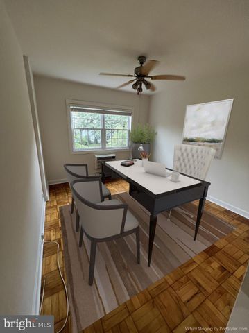 an outdoor space with patio and white umbrellas