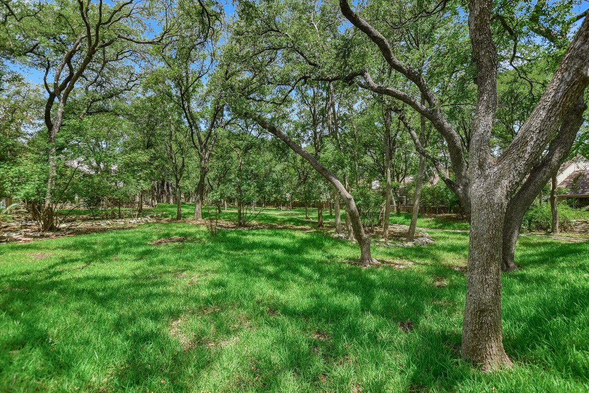 8314 Bent Tree Road Austin, TX 78759 - Photo 15 of 15 a view of outdoor space with deck and yard