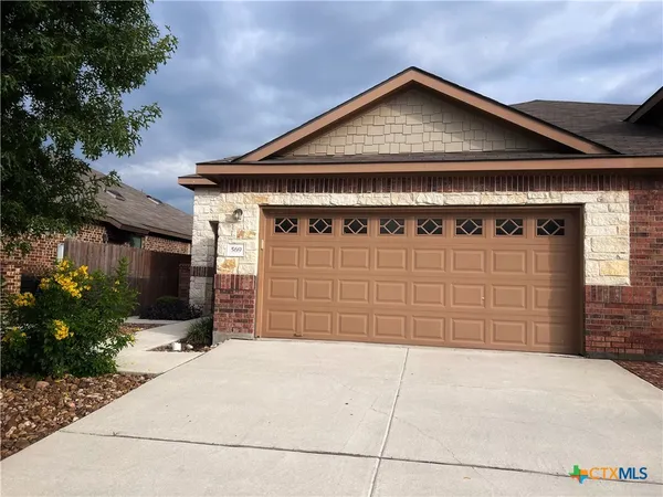 a view of a house with a outdoor space