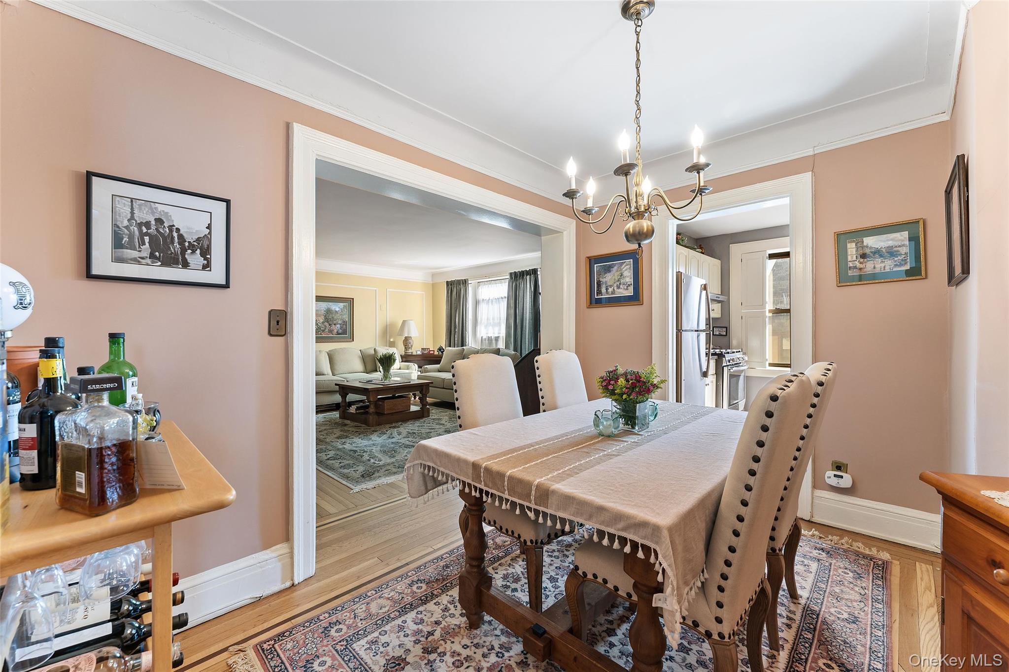 42 Pondfield Road West, Unit 6D Bronxville, NY 10708 - Photo 5 of 15 a view of a dining room with furniture and wooden floor