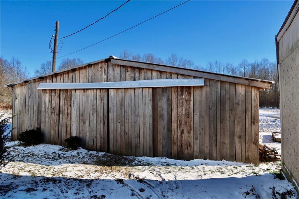 664 Airport Road Mercer, PA 16137 - Photo 17 of 20 a wooden door with a wooden fence