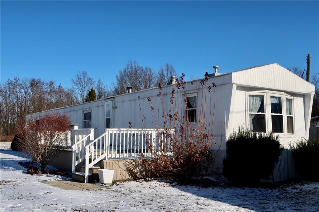 664 Airport Road Mercer, PA 16137 - Photo 2 of 20 a view of a house with backyard and sitting area
