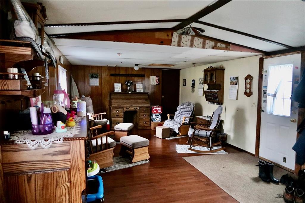 664 Airport Road Mercer, PA 16137 - Photo 7 of 20 a living room with furniture and a fireplace