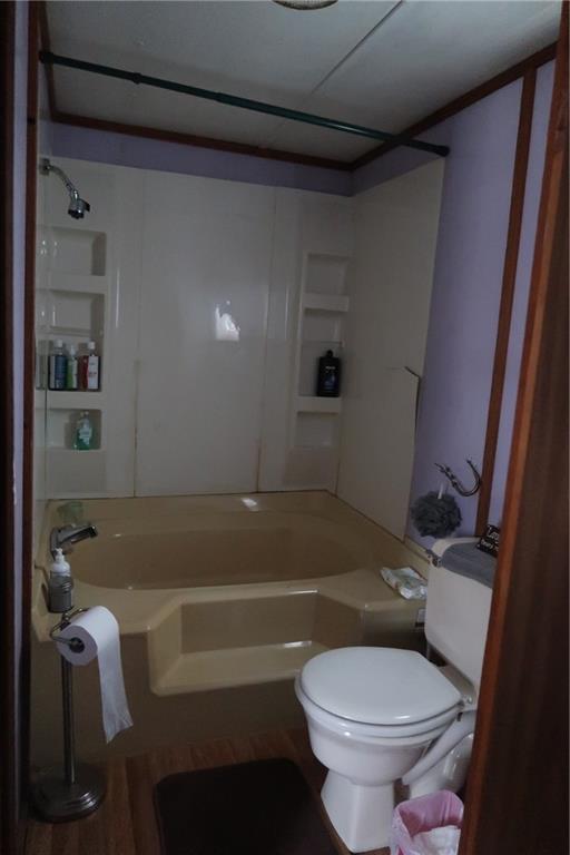 664 Airport Road Mercer, PA 16137 - Photo 10 of 20 a white toilet sitting next to a bath tub