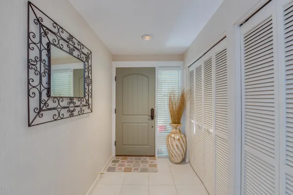 a bathroom with a mirror and a shower
