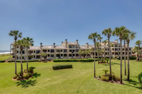 a view of a swimming pool with a garden
