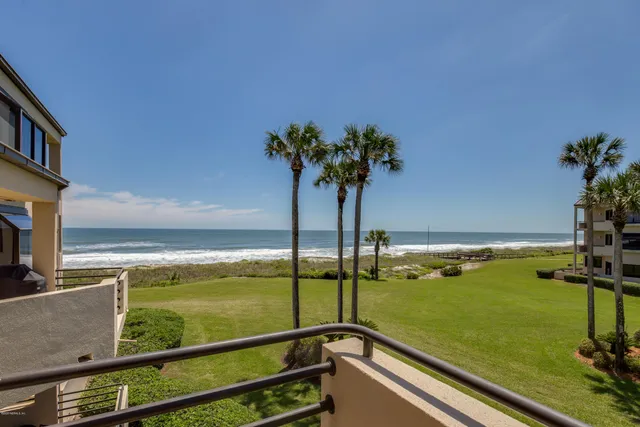 a view of an ocean from a balcony