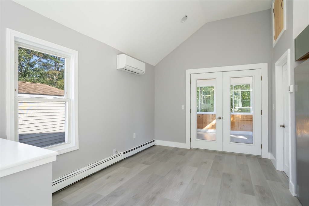 3 A Thompson Road, Unit A Bourne, MA 02532 - Photo 18 of 42 a view of an empty room with a window