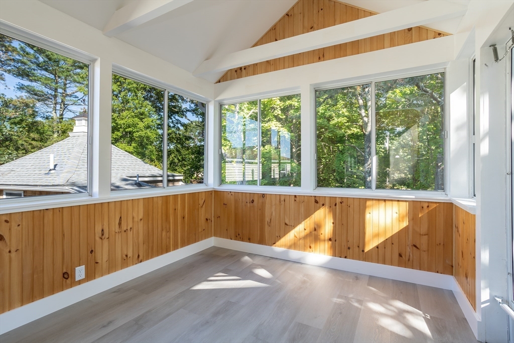 3 A Thompson Road, Unit A Bourne, MA 02532 - Photo 22 of 42 a view of a large window with an outdoor space