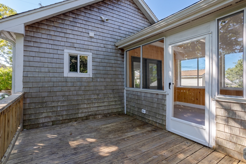 3 A Thompson Road, Unit A Bourne, MA 02532 - Photo 7 of 42 a view of entrance door of the house