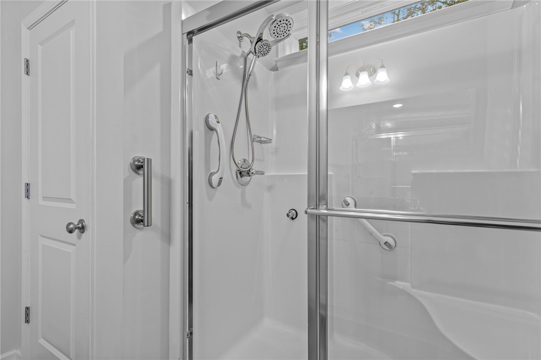 24 Chalet Court Anderson, SC 29621 - Photo 19 of 39 This bathroom showcases a convenient shower stall with practical accessibility features.