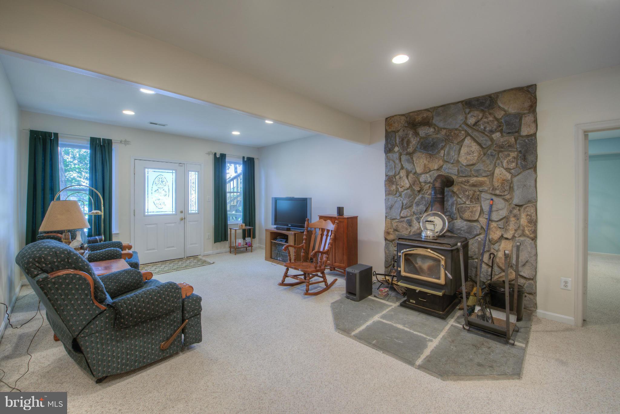 588 Douglas Road Mineral, VA 23117 - Photo 26 of 30 Full finished basement w/wood stove
