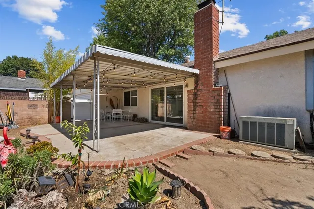 a view of house with patio