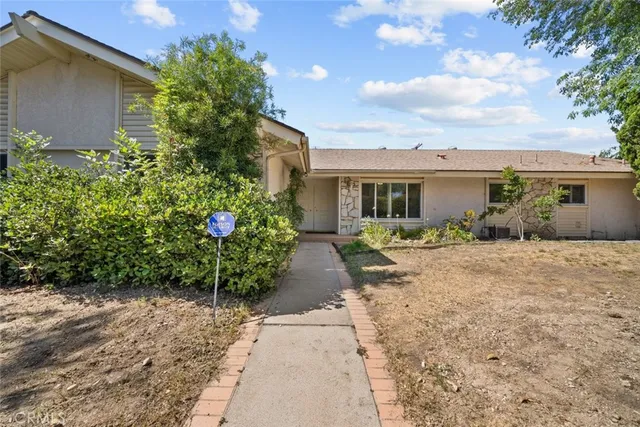 a view of a house with garden