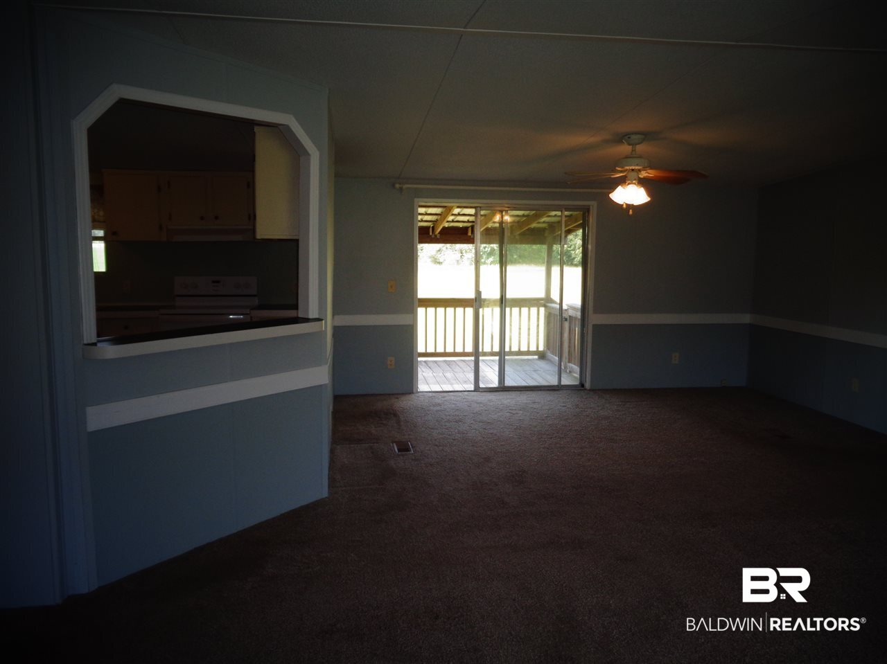 21535 A Glass And Spivey Road Robertsdale, AL 36567 - Photo 9 of 32 Door to back deck/porch.