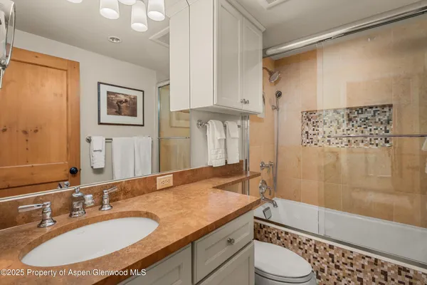a view of a dinning table and chairs in the patio