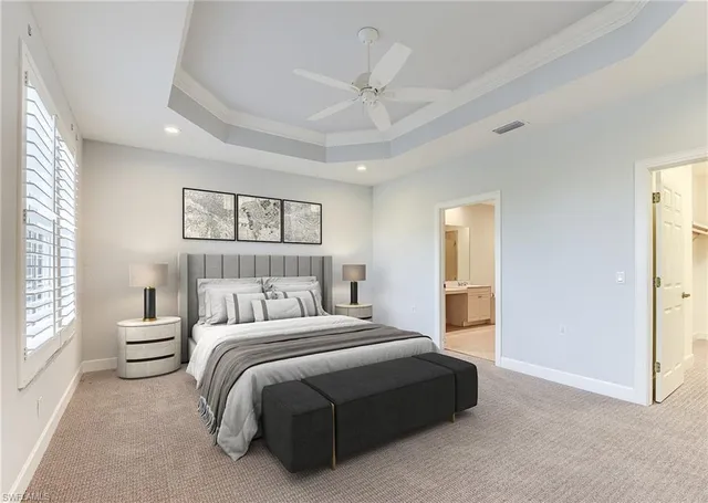 a view of an empty room with a ceiling fan