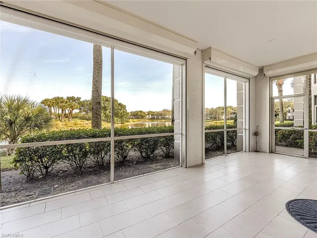 a view of a room with a large window