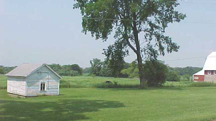 23091 Grade School Road Poplar Grove, IL 61065 - Photo 5 of 5 a view of a house with a backyard