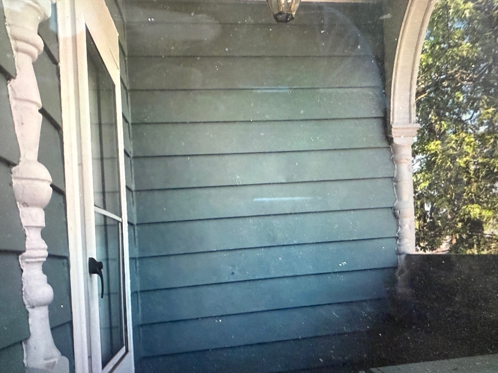 73 Kinsley Street, Unit B Nashua, NH 03060 - Photo 4 of 4 a bathroom with a toilet