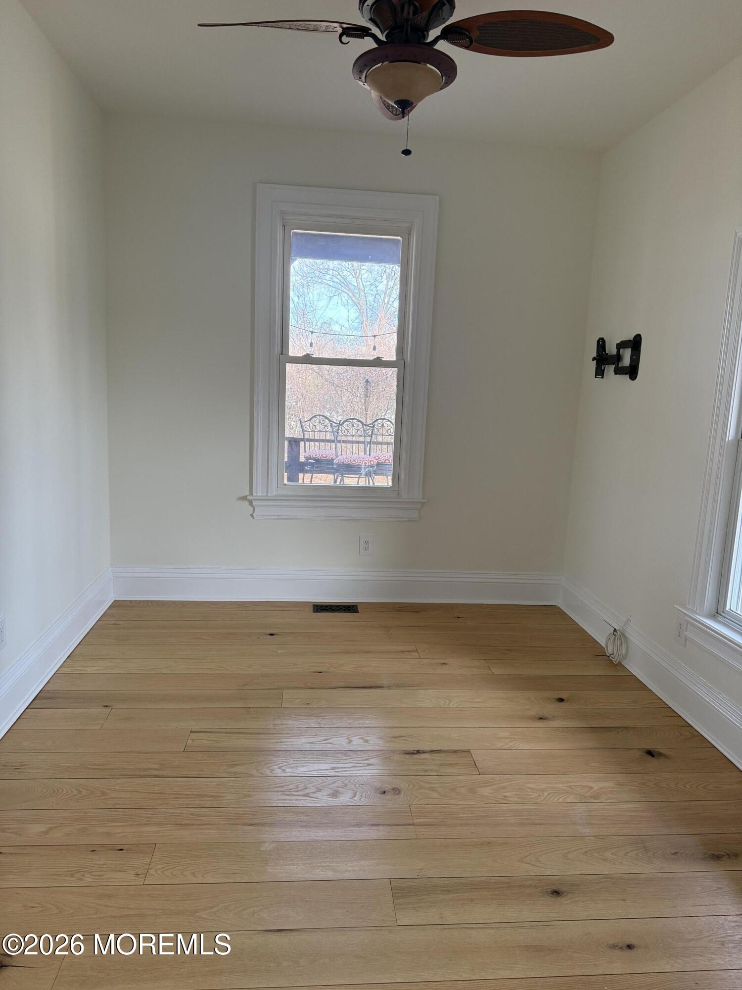 25 Monmouth Road, Unit 3 Oceanport, NJ 07757 - Photo 11 of 21 a view of an empty room with a window