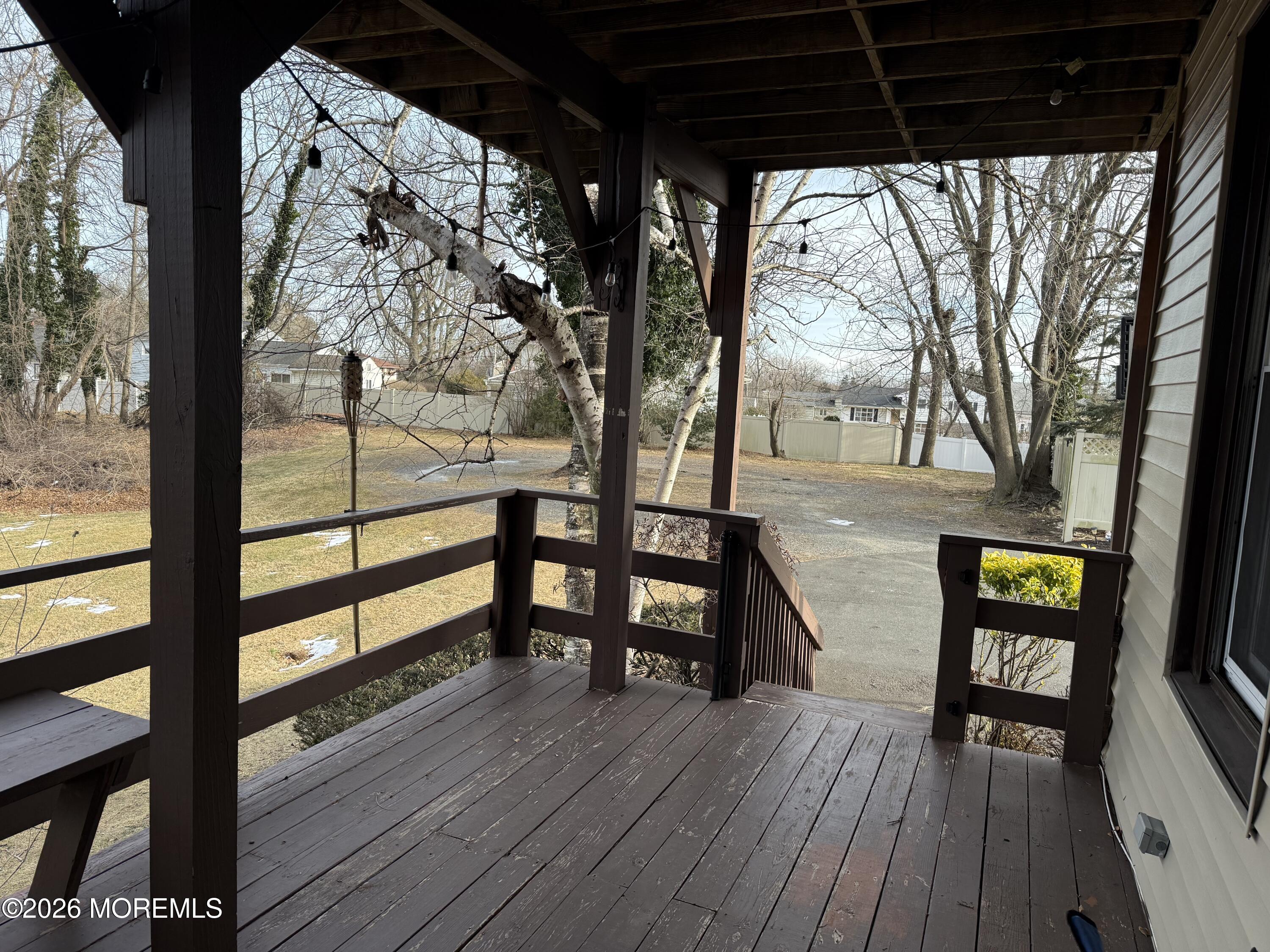 25 Monmouth Road, Unit 3 Oceanport, NJ 07757 - Photo 18 of 21 a view of a porch with wooden floor and furniture